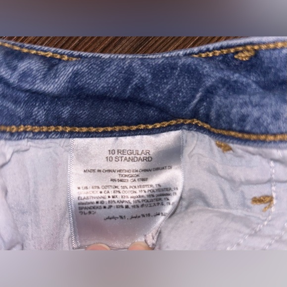 Old Navy Mid-Rise Rockstar Super-Skinny Ripped Cut-Off Ankle Jeans for Women - Picture 5 of 7